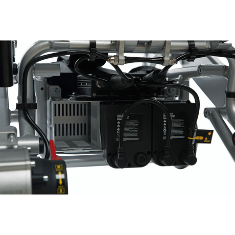 2 battries linked with cable in a electrical wheelchair