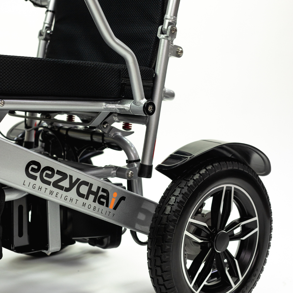 electric wheelchair showing 1 wheel a frame with the words eezychair 