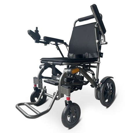 electric mobility wheelchair showing all wheels and arm rest up 